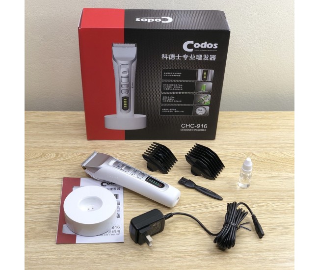 Masina de tuns profesionala cu LED si stand de incarcare Codos - Lama cu invelis din titan si cutit ceramic COS-916 Masina de tuns profesionala cu LED si stand de incarcare Codos - Lama cu invelis din titan si cutit ceramic COS-916